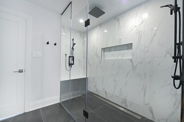 Modern bathroom with marble shower renovation