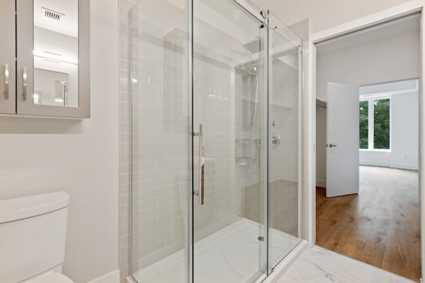 Modern glass shower with clean water flow